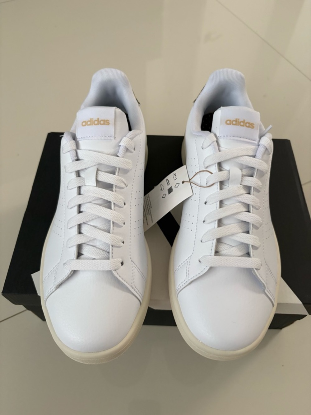 adidas White Sneakers with Gold Logo Accents